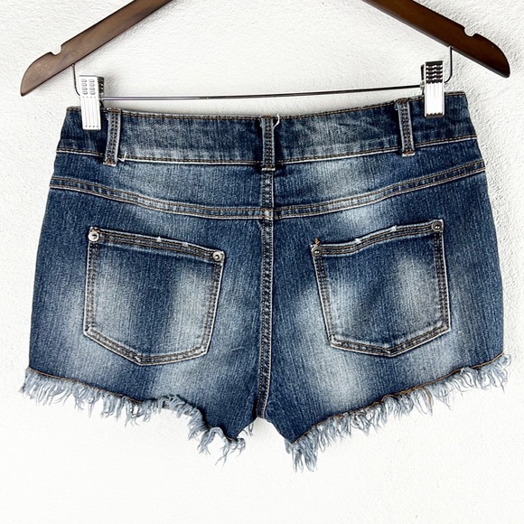 NO BOUNDARIES |🪨 Blue Faded Studded Low-Rise Cutoff Raw Hem Cutoff Jean Shorts - Picture 2 of 8